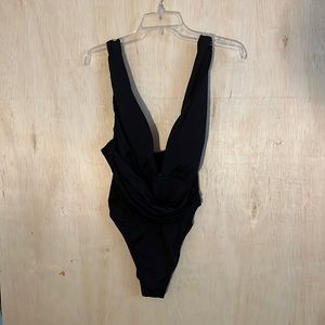 TRINA TURK Getaway Solids Wrap Front One Piece Swimsuit Black 12.